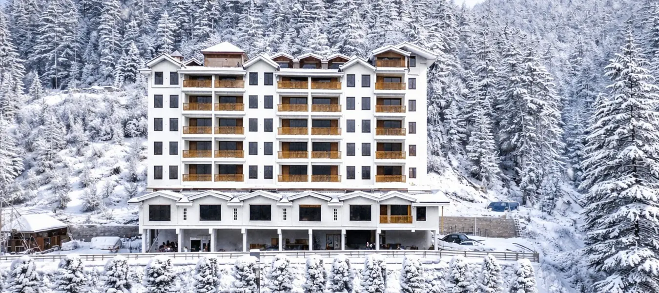 Snow-Clad Kufri Valley View from The Jungle Mountain Retreat Shimla
